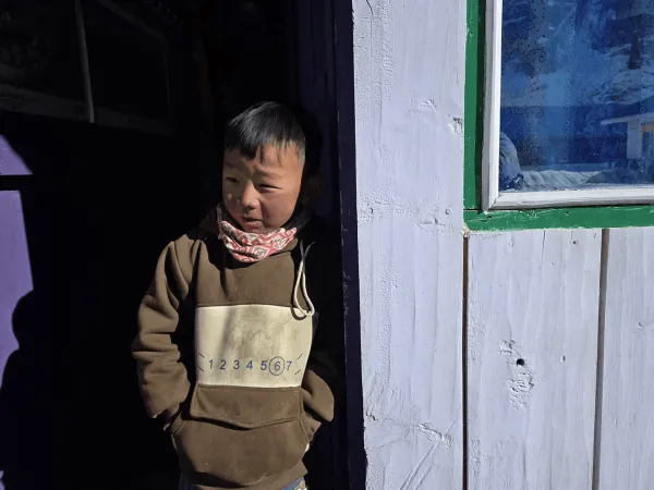 Happy Child At Teahouse In Kanchenjunga Trek