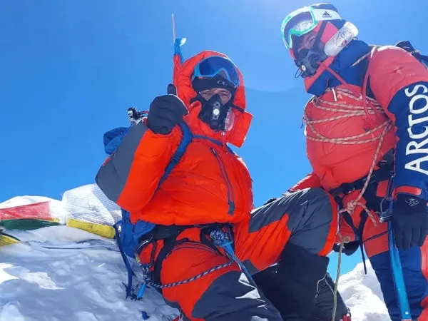 Mountaineers Reaching The Summit Of Everest
